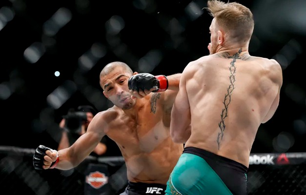 McGregor bate José Aldo em 13 segundos e fica com cinturão dos penas